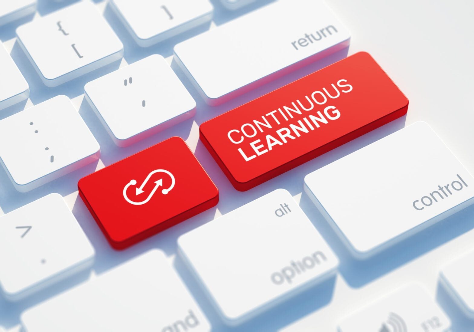Continuous Learning Icon Concept on the Red Keyboard Button